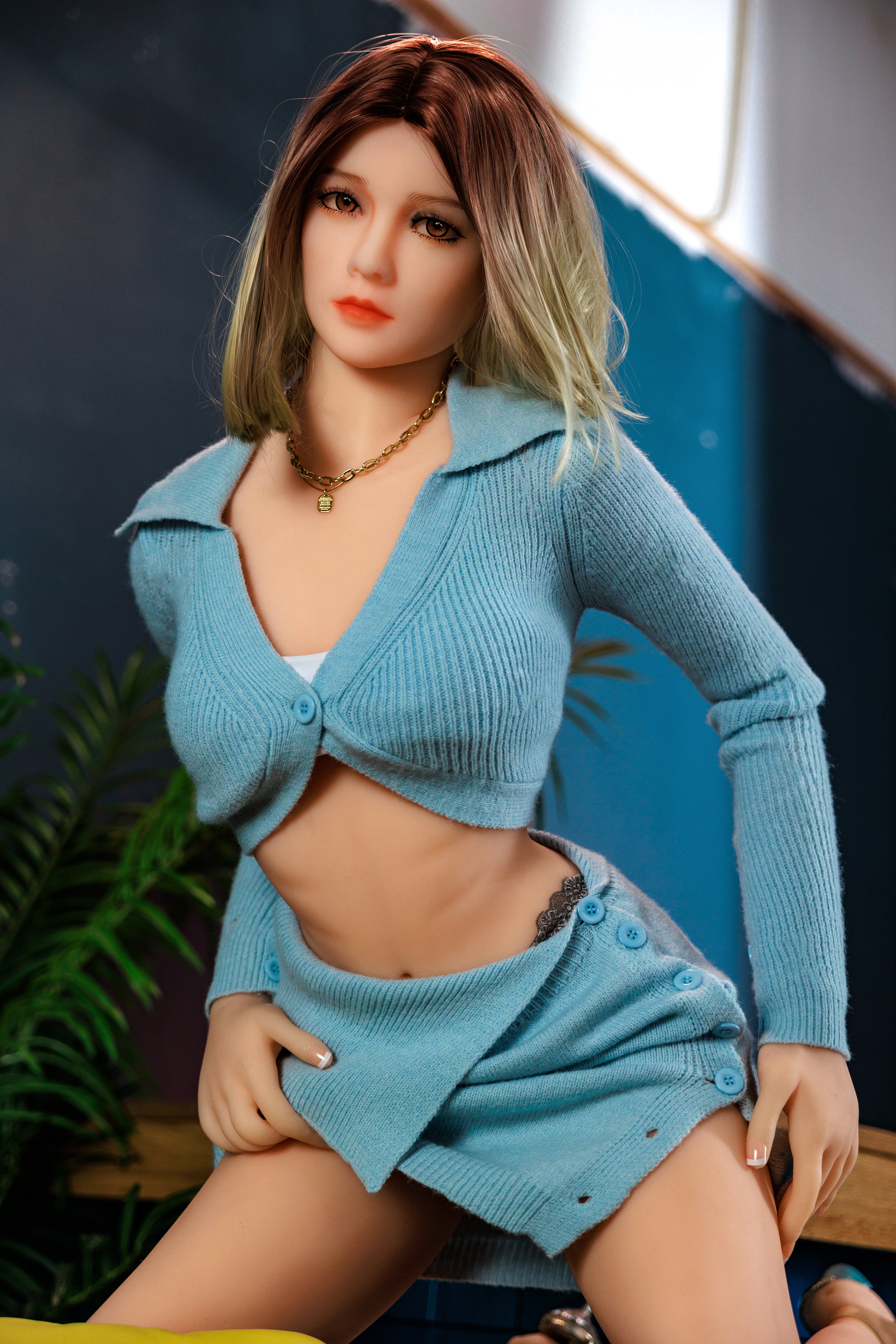 A doll with a slim body, perky hips, and plump breasts and buttocks, as well as a face-thinning realistic doll