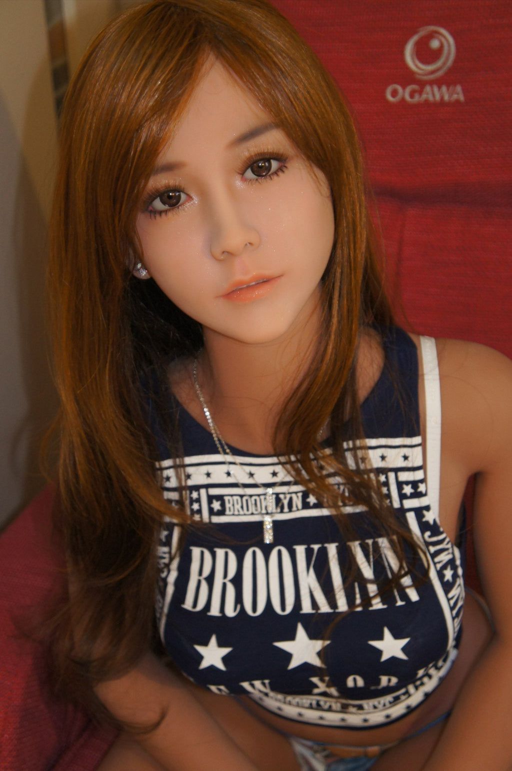 A doll with a slim body, perky hips, and plump breasts and buttocks, as well as a face-thinning realistic doll