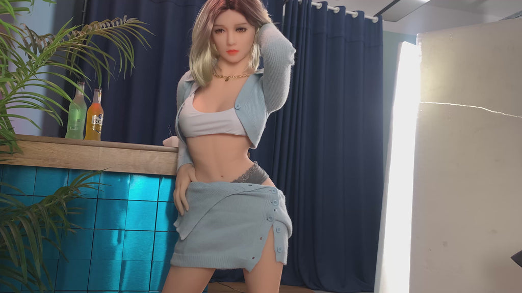 A doll with a slim body, perky hips, and plump breasts and buttocks, as well as a face-thinning realistic doll