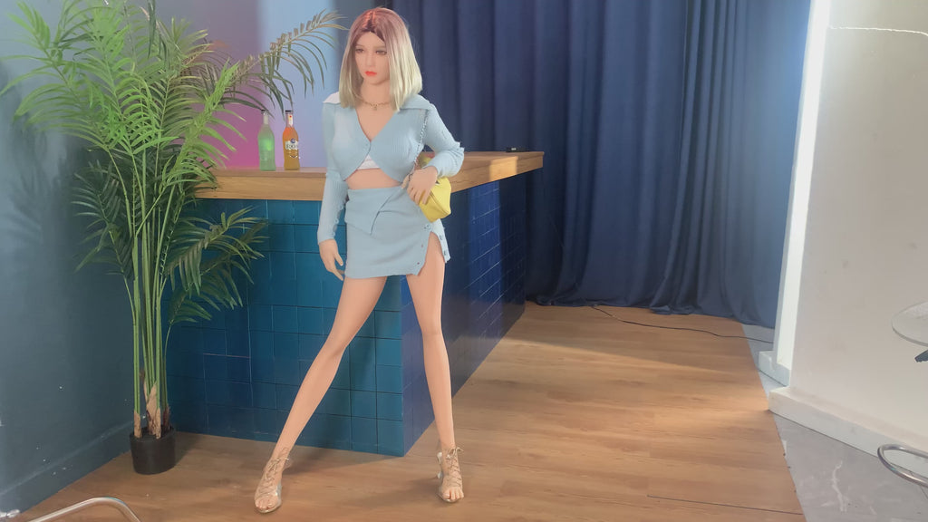 A doll with a slim body, perky hips, and plump breasts and buttocks, as well as a face-thinning realistic doll